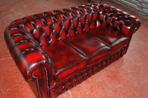 tufted red couch